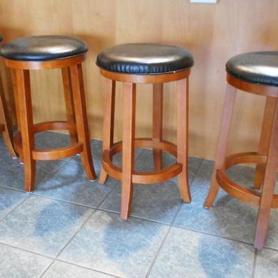Set of Four Bar Stools with Cushioned Seats