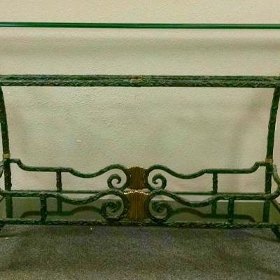Cast iron console table with green petina, with two tiered glass table.