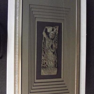Indonesian fragment of a women, framed in a shadow box and layered frame