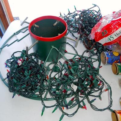 Lot 232: Group of Christmas Decorations, Tree Stand and Wrap