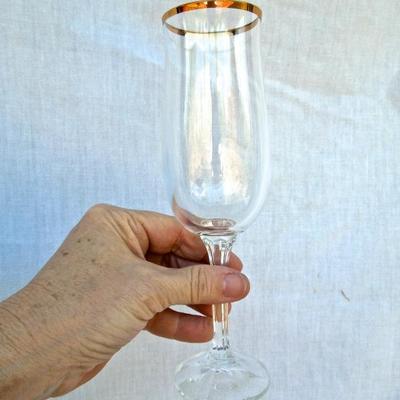 Lot 230: Seventeen Noritake "Bradford" Gold Rim Champagne Flutes
