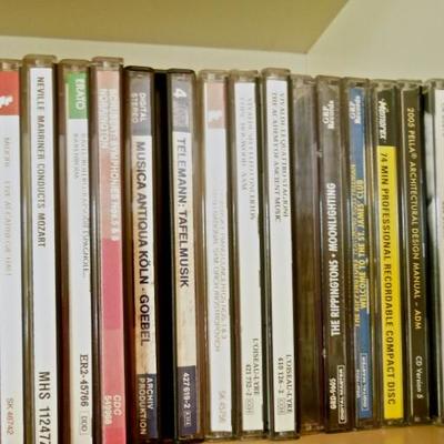 Lot 47: Thirty Three (33) CD's and CD Cleaner Disc
