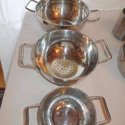 Lot 77:  Twelve Kitchen Tools Stainless Bowls, Colanders, Measuring, etc.