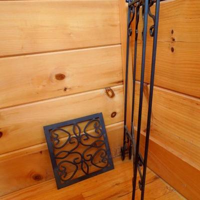 Lot 121: Four Scrolled Collapsable Iron Plant Stands