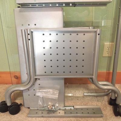 Lot 104: Computer Desk Glass Top Steel Frame Rolling 