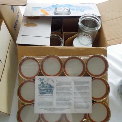 Lot 186: Huge Lot of Glass Storage Jars and Lids