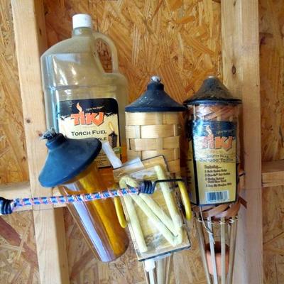 Lot 223: Two Tikki Torches, Wicks and Fuel