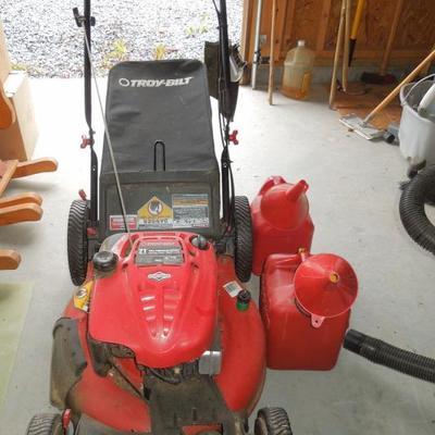 Lot 214: Troy-Bilt 21" Self Propelled Mulching Lawn Mower and 2 Gas Jugs