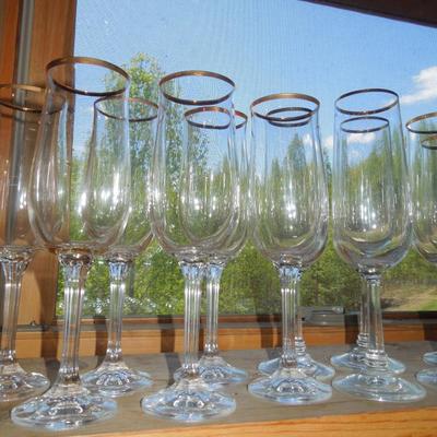 Lot 230: Seventeen Noritake "Bradford" Gold Rim Champagne Flutes