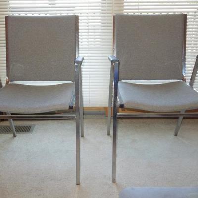 Lot 112: Two Grey Upholstered Metal Frame Stacking Chairs