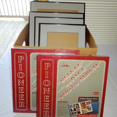 Lot 172: Four Brushed Metal Frames and Two Unused Leather Photo Albums