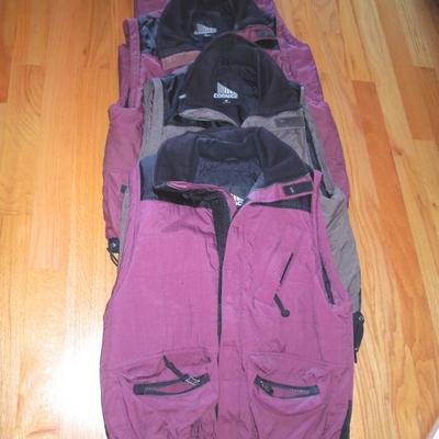 Lot 24: Four Unisex Nylon/Polar Fleece Sherpa Vests