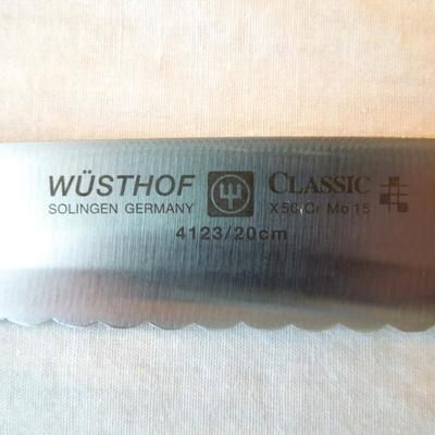 Lot 70: Eight Chef Knives and 5 Steak Knives, Whetstones and Cutting Board
