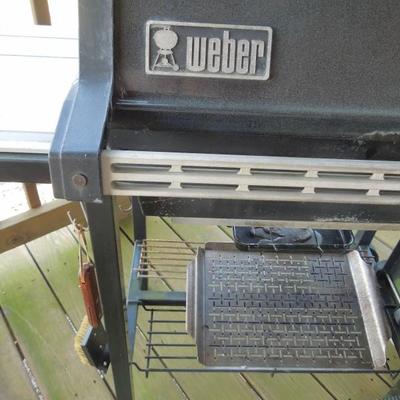 Lot 60: Weber Gas Grill with Two 15 lb Propane Tank Grilling Tools