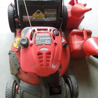 Lot 214: Troy-Bilt 21" Self Propelled Mulching Lawn Mower and 2 Gas Jugs