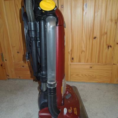 Lot 99: Eureka Boss 4870 Upright Vac and Attachments