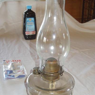 Lot 55: Glass Hurricane Lamp, Oil, Wick and Funnel