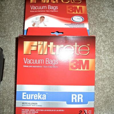 Lot 99: Eureka Boss 4870 Upright Vac and Attachments