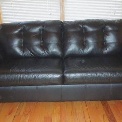 Lot 45: Black Bonded Leather Tufted Couch Ashely Furniture 