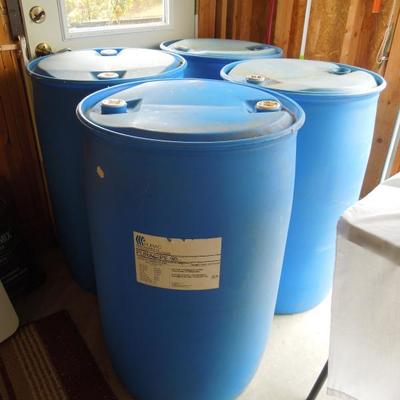 Lot 174: Four Empty Large Industrial Blue Plastic Storage Barrels