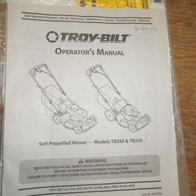 Lot 214: Troy-Bilt 21" Self Propelled Mulching Lawn Mower and 2 Gas Jugs