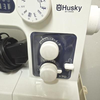Lot 171 A: Husky by Viking Sewing Machine with Case