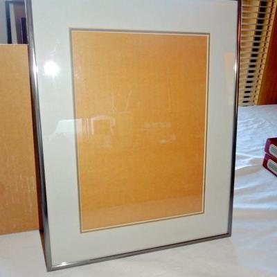 Lot 172: Four Brushed Metal Frames and Two Unused Leather Photo Albums