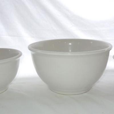 Lot 179: Three Solid White Ceramic Nesting Mixing Bowls