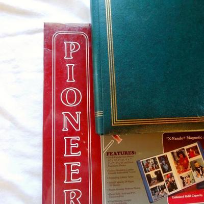 Lot 172: Four Brushed Metal Frames and Two Unused Leather Photo Albums