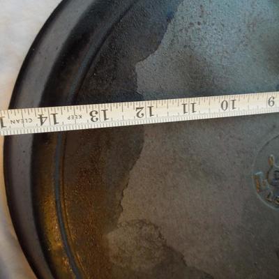 Lot 96: Six Cast Iron Skillets 15" - 6"  and 14" Wok