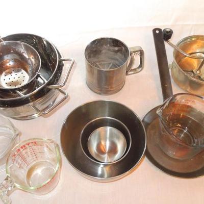 Lot 77:  Twelve Kitchen Tools Stainless Bowls, Colanders, Measuring, etc.
