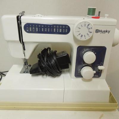 Lot 171 A: Husky by Viking Sewing Machine with Case