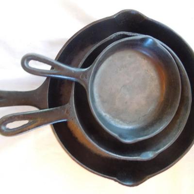 Lot 96: Six Cast Iron Skillets 15" - 6"  and 14" Wok