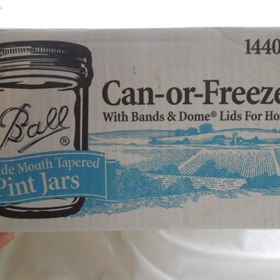 Lot 186: Huge Lot of Glass Storage Jars and Lids