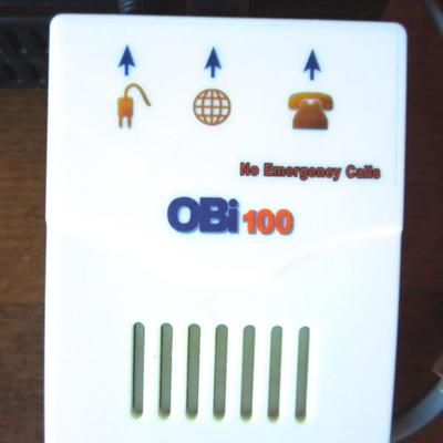 Lot 125: OBI VOIP Adapter and Frontier Internet Router/Modem 