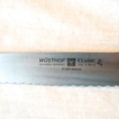 Lot 70: Eight Chef Knives and 5 Steak Knives, Whetstones and Cutting Board