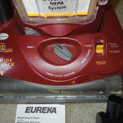 Lot 99: Eureka Boss 4870 Upright Vac and Attachments