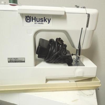 Lot 171 A: Husky by Viking Sewing Machine with Case