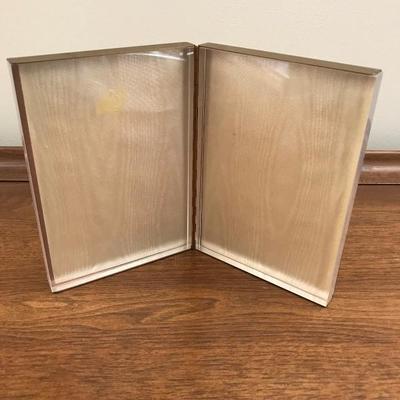 Lot 134-Mid-Century Brass and Lucite Double Hinged Photo Frame