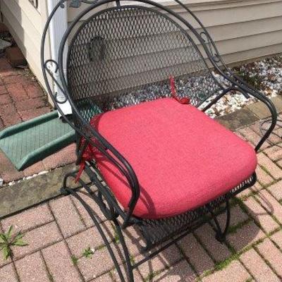 Lot 475-Outdoor Iron Barrel Back Spring Chair