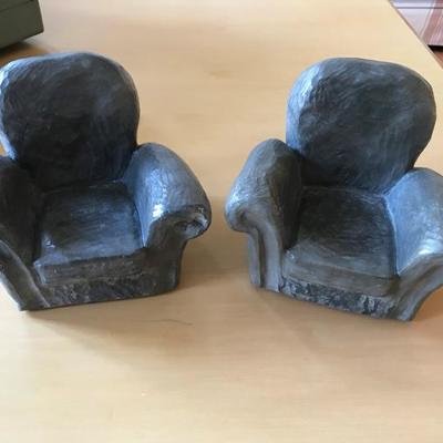 Lot 386-Pair of Strauch Glazed Cement Club Chair Bookends