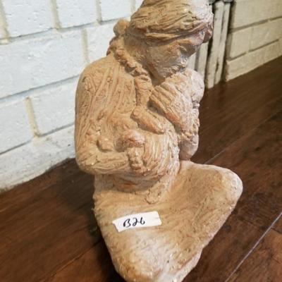 Nurturing Mother Holding Baby Clay Sculpture