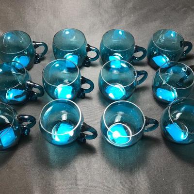 Lot 49- MC Set of Twelve Burmese Handblown Teal Glass Punch Cups