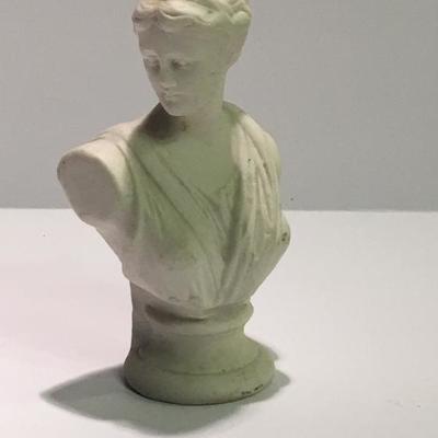 Tiny bust of woman