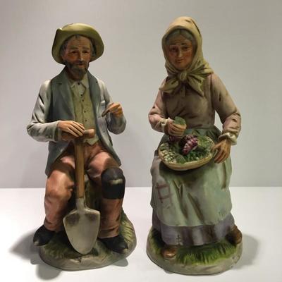 Homco Figurine Porcelain Old Couple sitting on a Stump. 