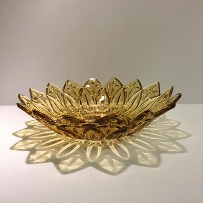 Vintage Amber sunflower pressed glass bowl.