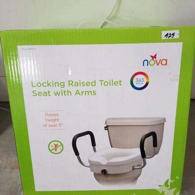 New In Box Locking Raised Toilet Seat w/ Arms