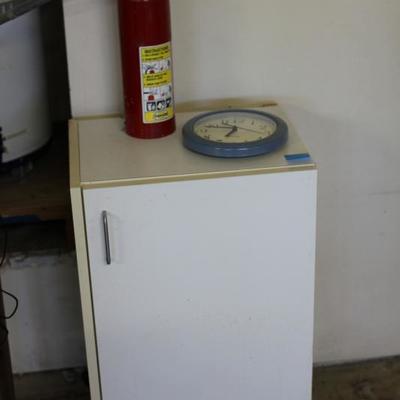 Lot 106: White Cabinet, Fire Extinguisher, Clock