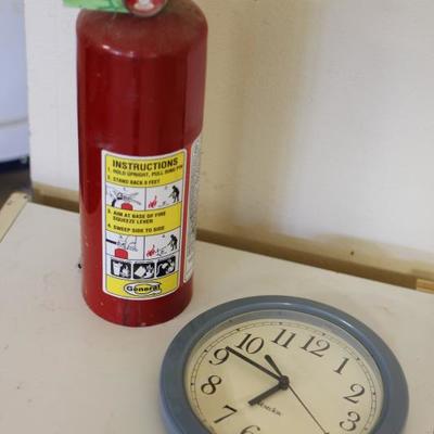 Lot 106: White Cabinet, Fire Extinguisher, Clock