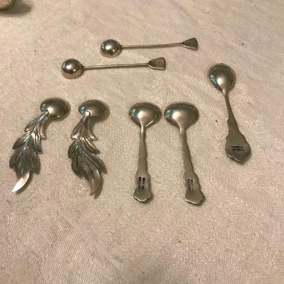 Lot 85 - Sterling Silver Salt Spoons and Baby Rattle